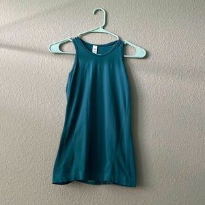 An athleta girl power up tank in a blue green color! Barely worn and super cute!